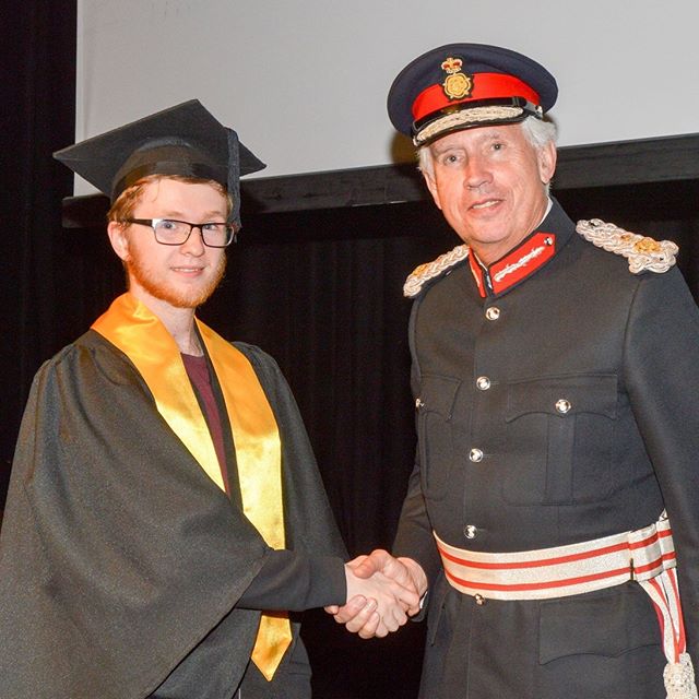 Mark, Web Developer, receiving his award